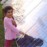 childwithphotovoltaiccollector.jpg